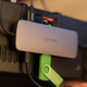 The rear of a Steam Deck shows off a USB-C hub held in place with the Deckmate puck mount.
